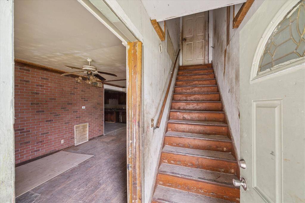 Stairs leading to 1BR unit upstairs