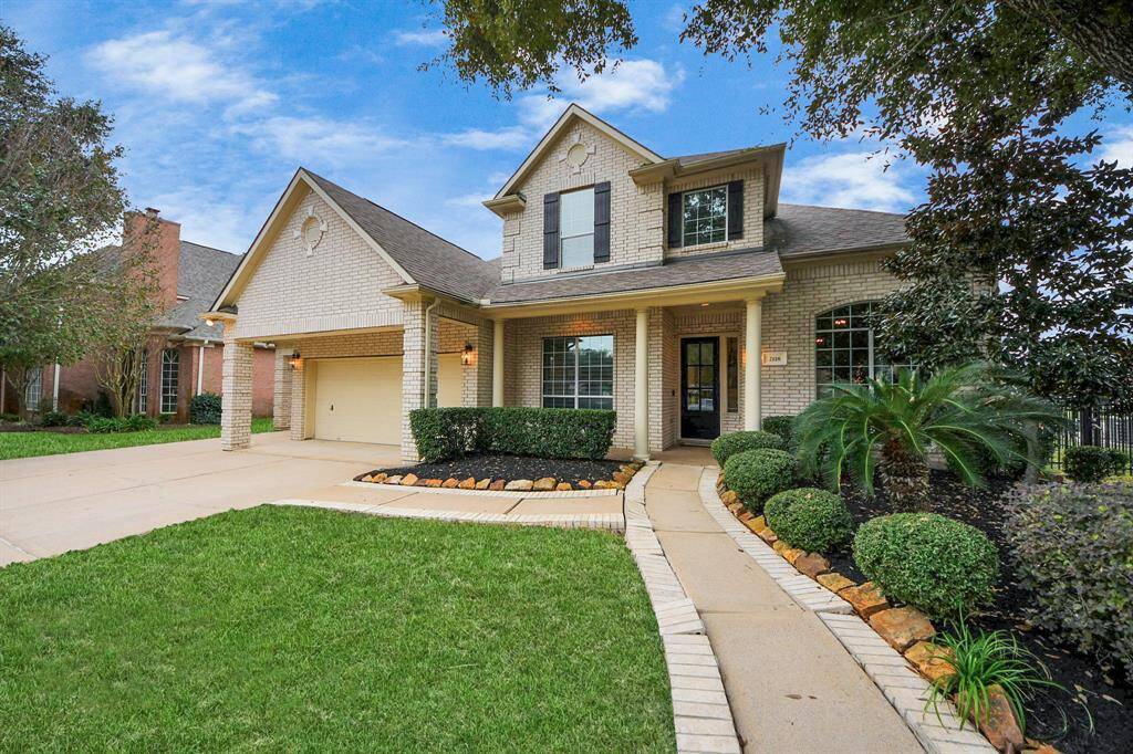 Lovely front porch, but you will want to spend most of your time in the back yard of this home. Come take a look for yourself!