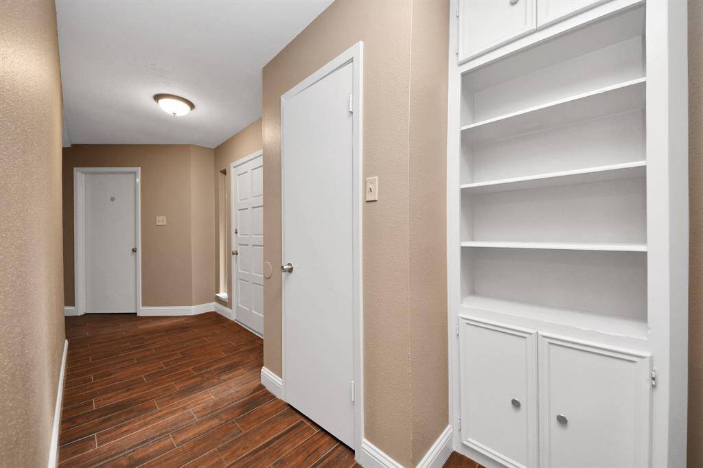 Hallway has built in storage and great closet space!