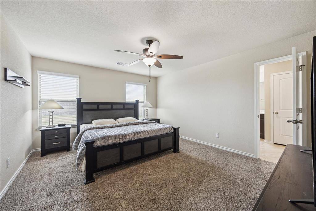 Master bedroom on the 1st floor, tucked in the back of the home