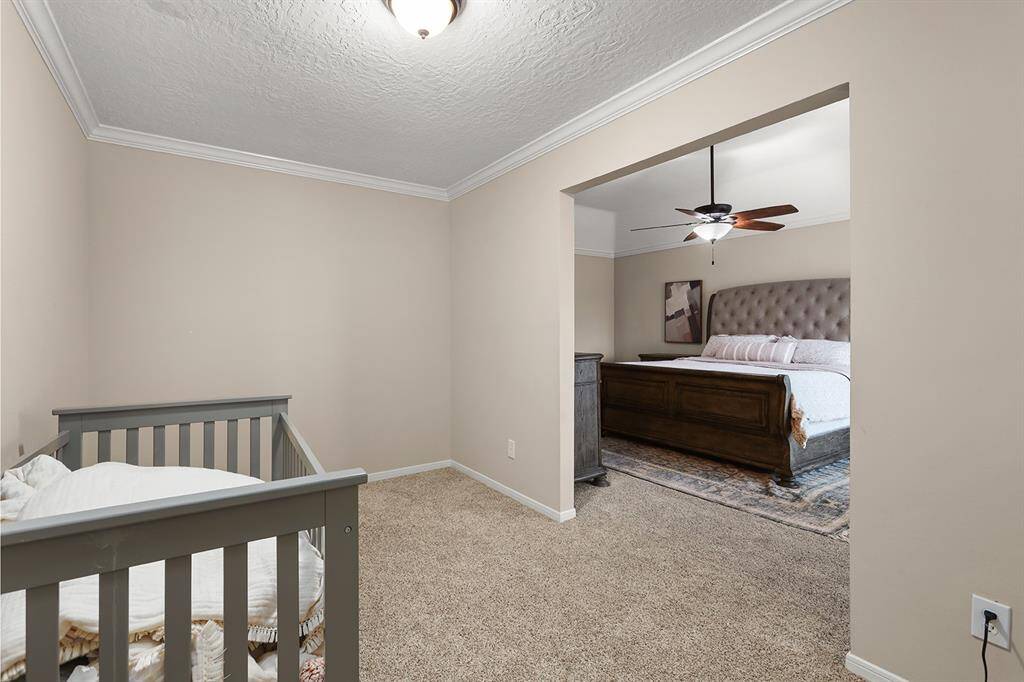 Primary Suite Features Extra Room for Nursery or Study