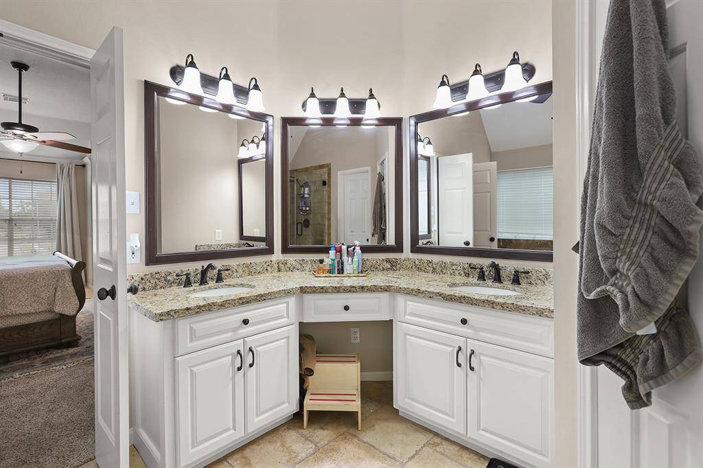 Primary Bath with Double Sinks and Granite Countertop
