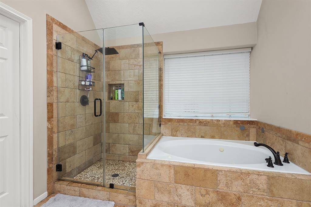 Updated Shower with Seamless Door and Garden Tub