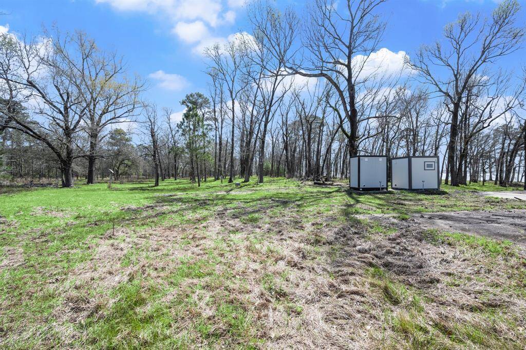 Includes 2 very nice bathrooms which are connected to an aerobic septic system.