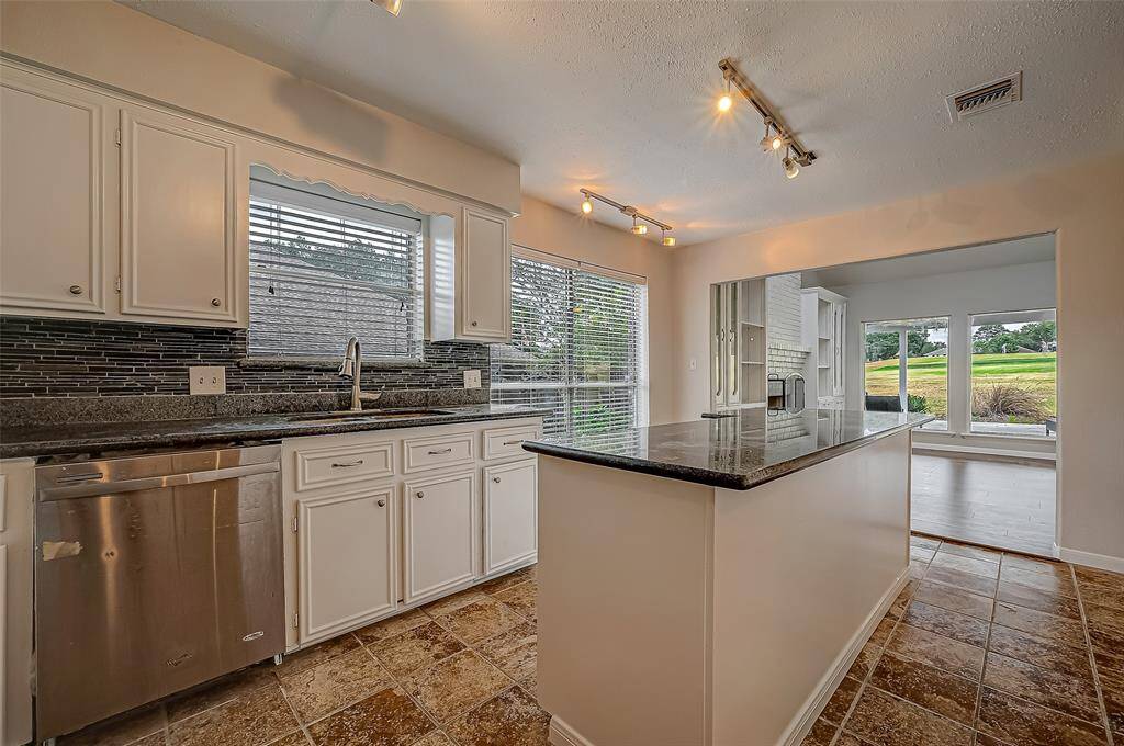 Garage leads into the kitchen for easy grocery unloading.
