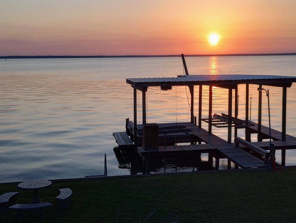 sunset over boathouse