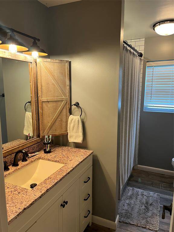 Hall full bath with shower and tub