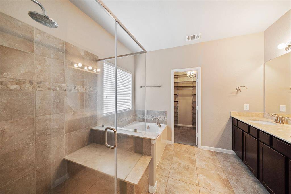 Oversized shower with bench