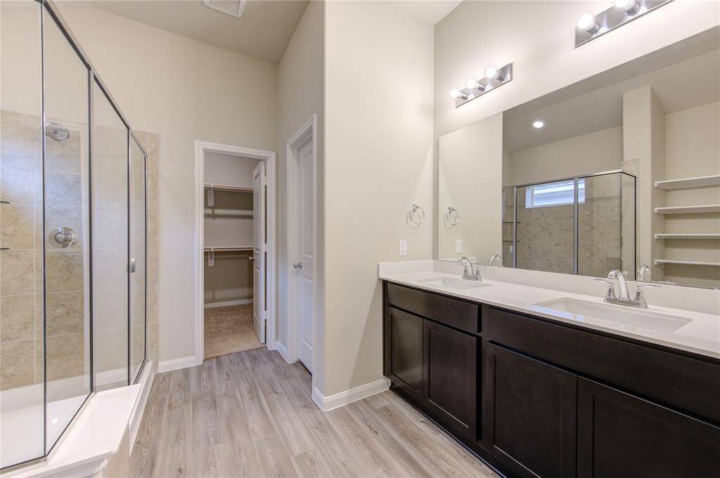 Take advantage of the large primary bathroom ...
