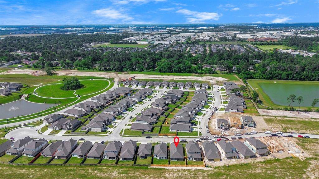 This home sits on a large lot with ample yard space in front and the back, lush landscaping and a well-maintained yard.