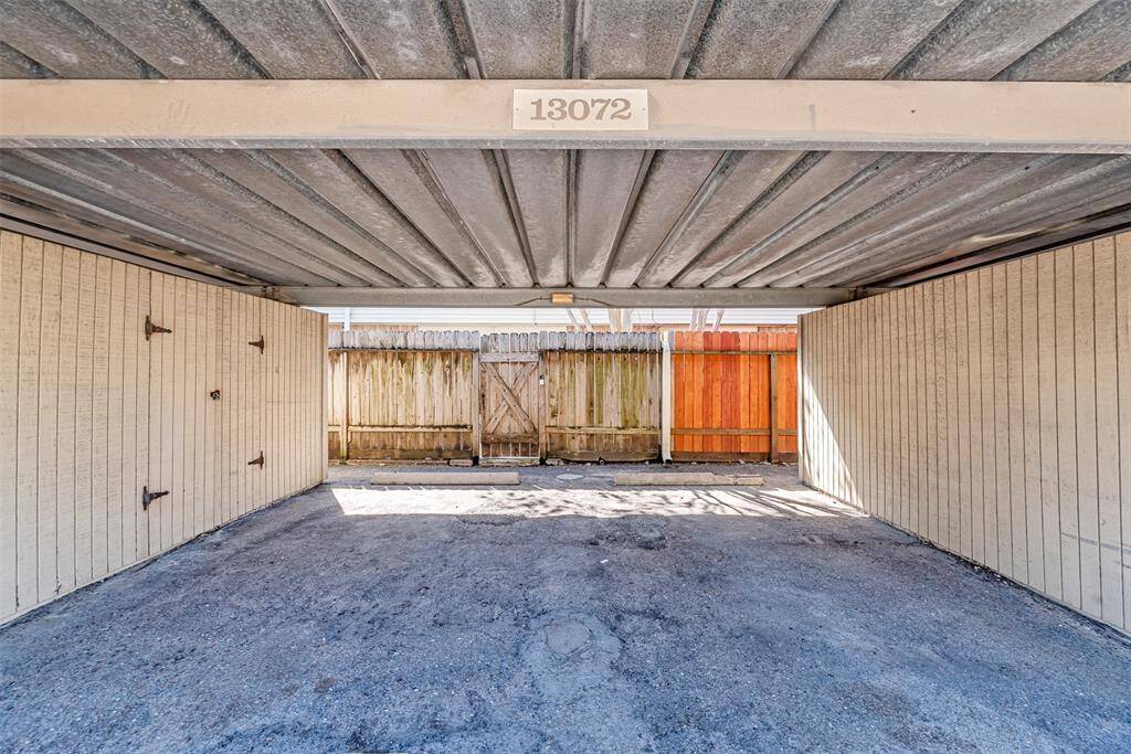 Covered parking area with easy access to the home, providing protection from the elements