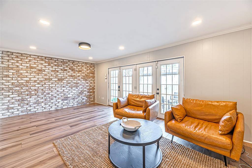 A cozy den with versatile space for lounging, working, or family activities