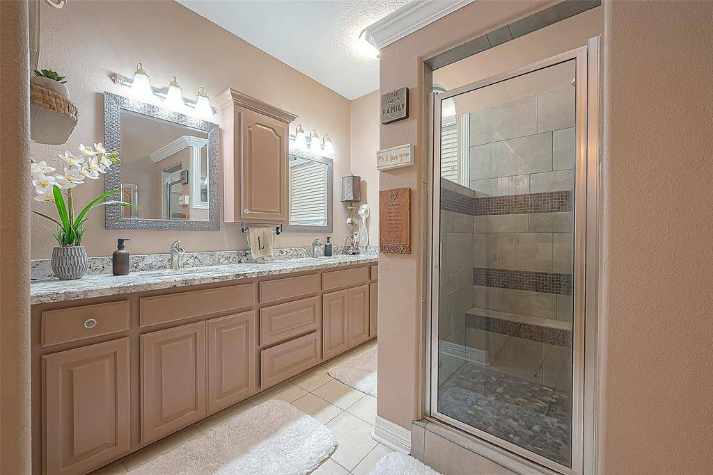 Double sinks and walk-in shower