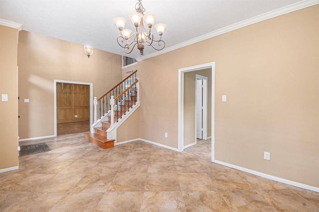 The family room seamlessly flows into the kitchen, creating a warm and inviting space that’s perfect for easy entertaining and everyday living. This open-concept design ensures everyone stays connected, whether you’re hosting guests or enjoying a quiet night in.