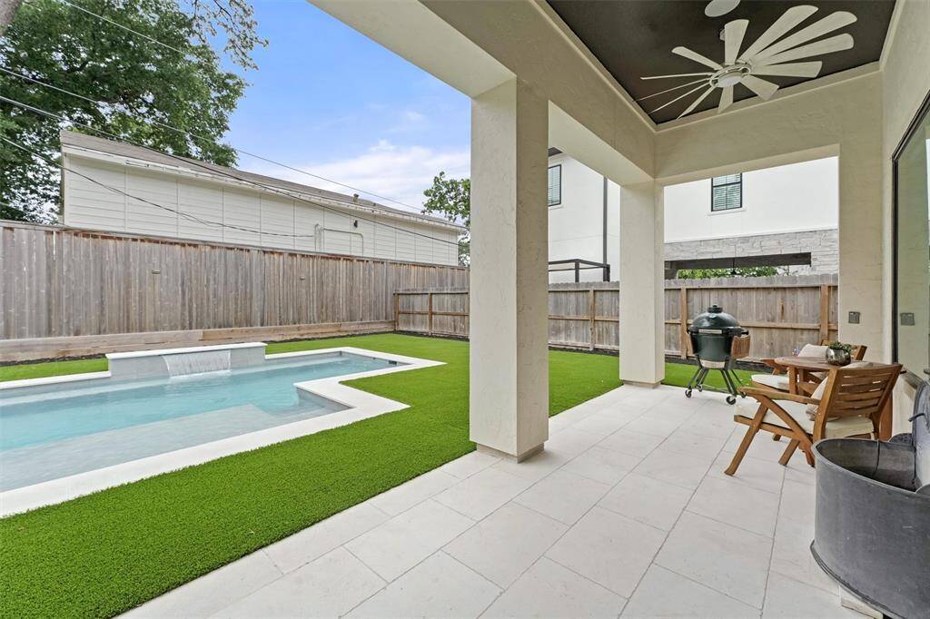 A sneak peak outside the living room shows the outdoor patio and the pool. We will return to look at this area; back inside we go!