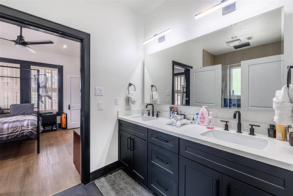 The bathroom has been tastefully renovated, and the floors have been updated throughout, blending modern amenities with the home’s original charm.