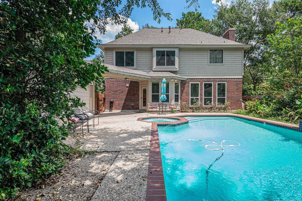 This backyard is a true retreat! Gorgeous heated pool, spa, and the water falls add to this beautiful outdoor space.