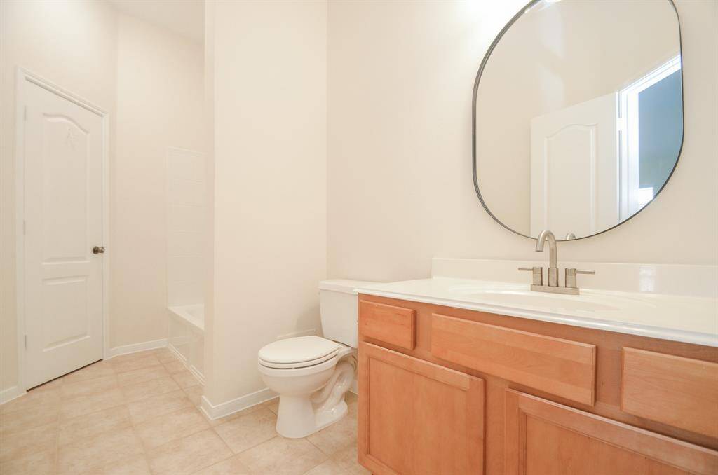 A dynamic secondary bath offers the same comforts as its primary counterpart.