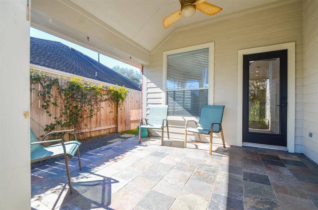 Don't be shy! Set out your favorite seasonal seating and table pieces with privacy fencing surrounding the entire back property.