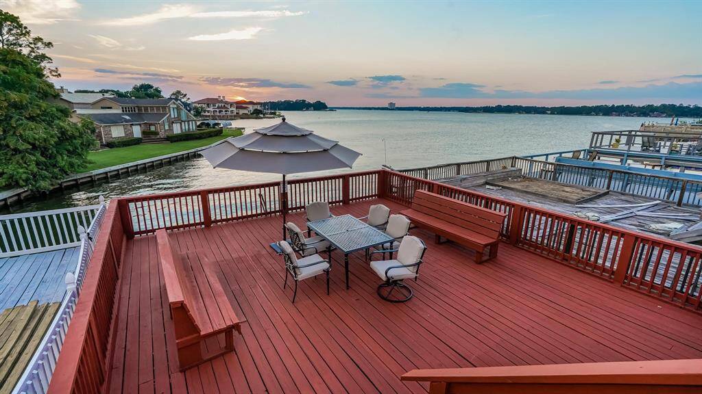 Another patio area where you can relax with family and enjoy a glass of wine while you take in the views of Lake Conroe.