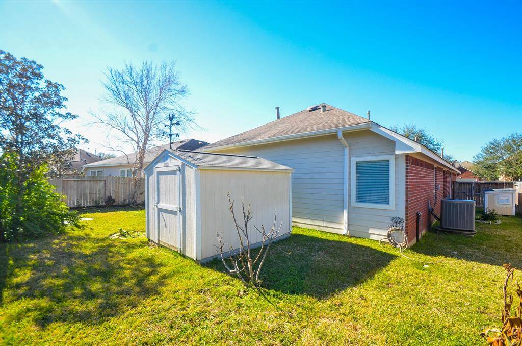 What's a well-kept backyard without a trusty garden shed?
