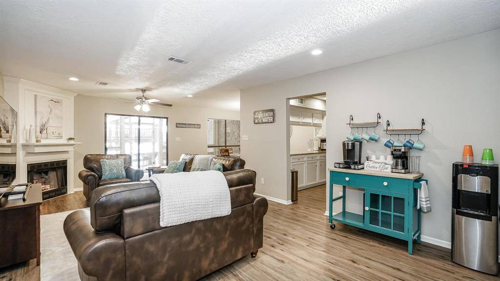From this angle you can see there is plenty of natural lighting through the sliding glass doors.