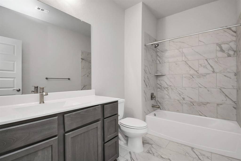 Sample photo of completed home with similar floor plan. Actual colors and selections may vary.