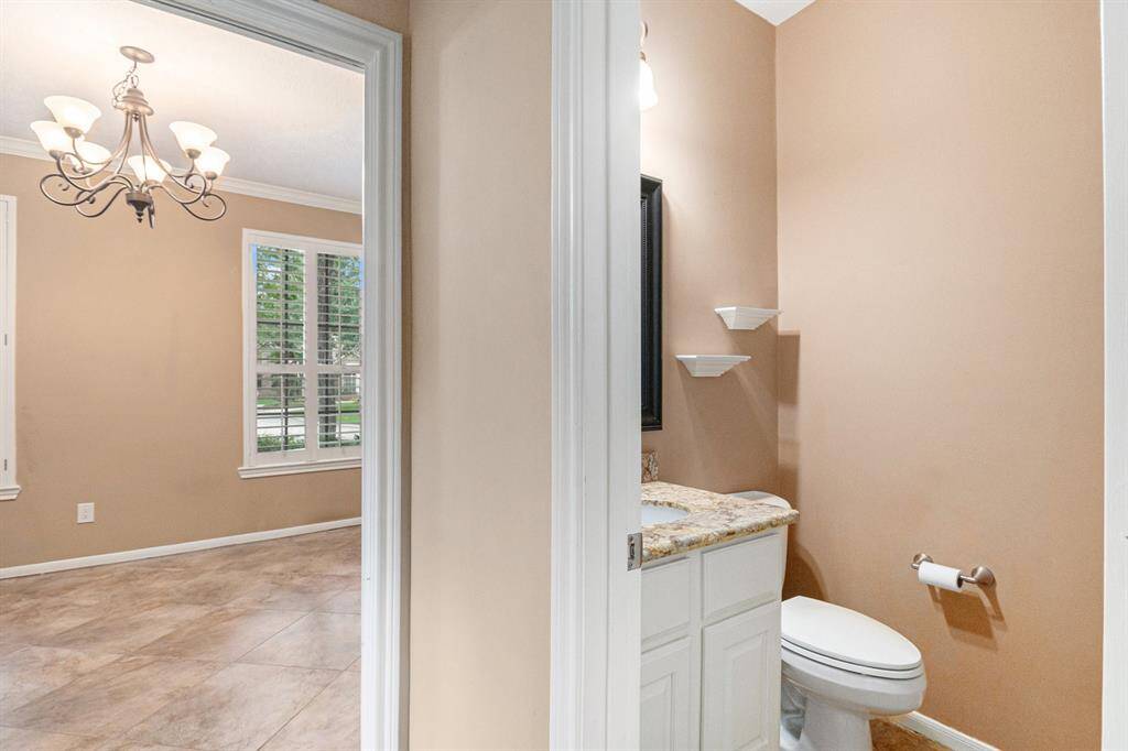 The chef in your family will love cooking in this large open style Kitchen. The island is great for prepping your favorite meals or buffet style dining. It features a granite top island with cabinet for storage.