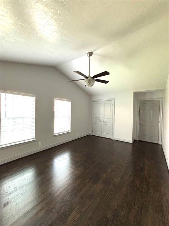 large master bedroom with vaulted ceiling