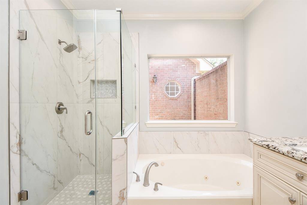 Primary bathroom has been remodeled.