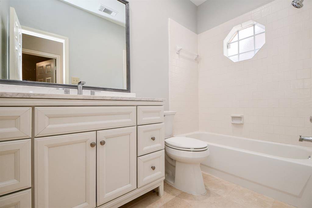 Secondary bath with lovely updates.