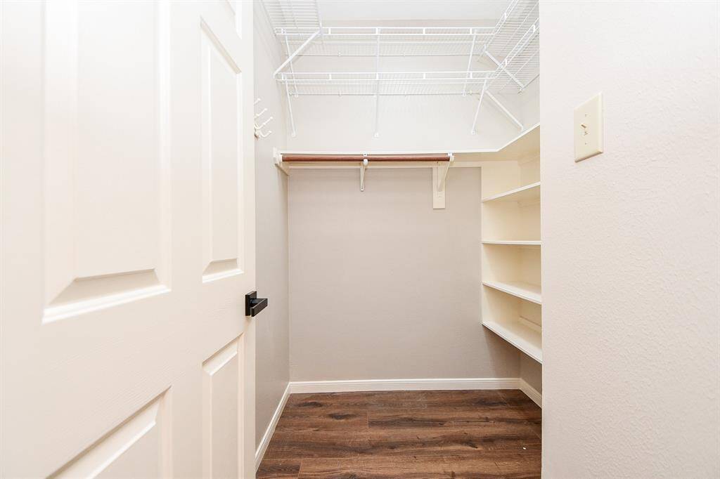 One of three hall closets for additional storage.