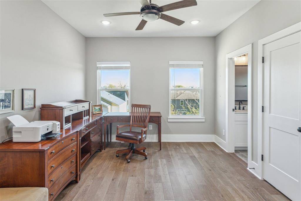 Spacious third-floor guest bedroom with its own en suite bathroom for added privacy and comfort.