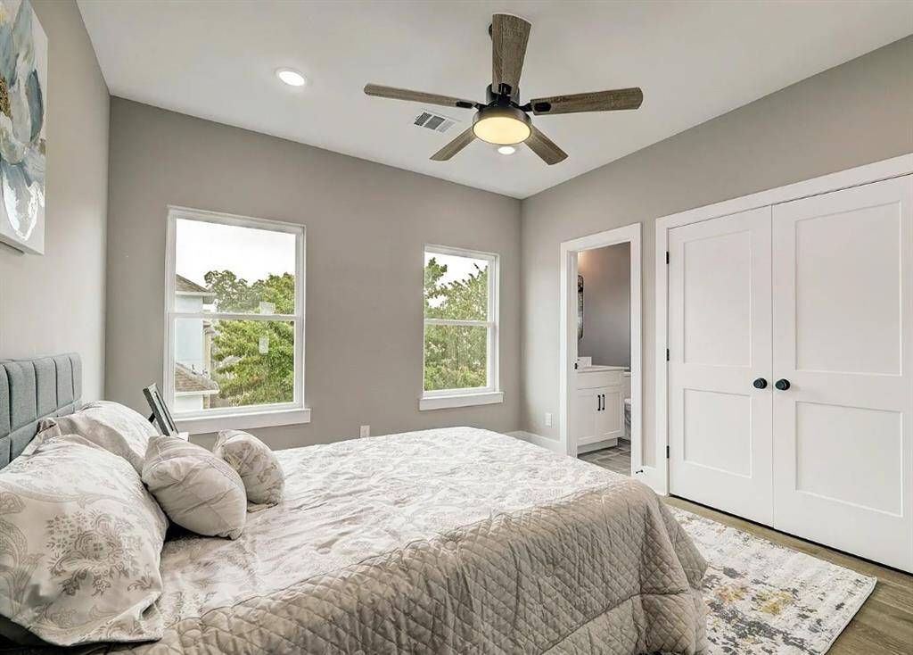 *Model home* this is the third bedroom staged as a guest room instead of an office. Same finishes and flooring.