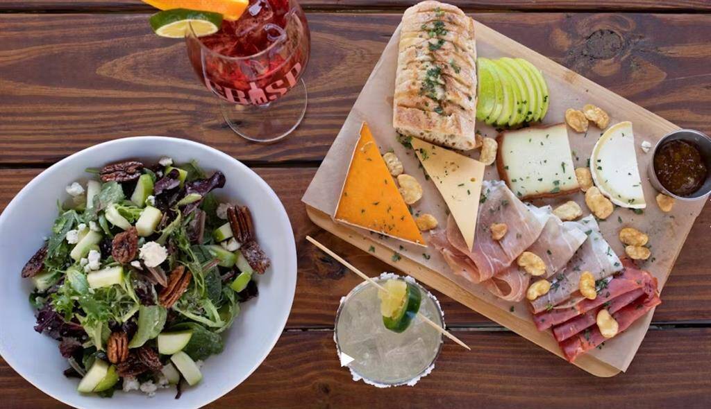 Rainbow Lodge. Houston restaurant featuring Wild Game, Steaks + Seafood. Gorgeous Trout Stream Bar - Stellar Wine Cellar