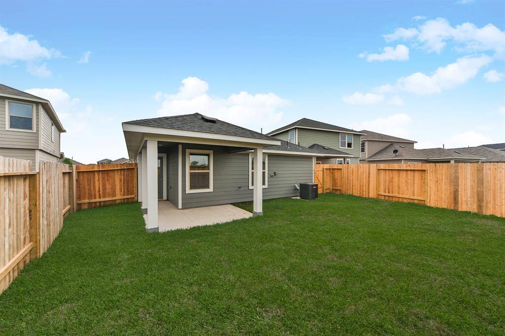 Sample photo of completed home with similar floor plan. As-built color and selections may vary.