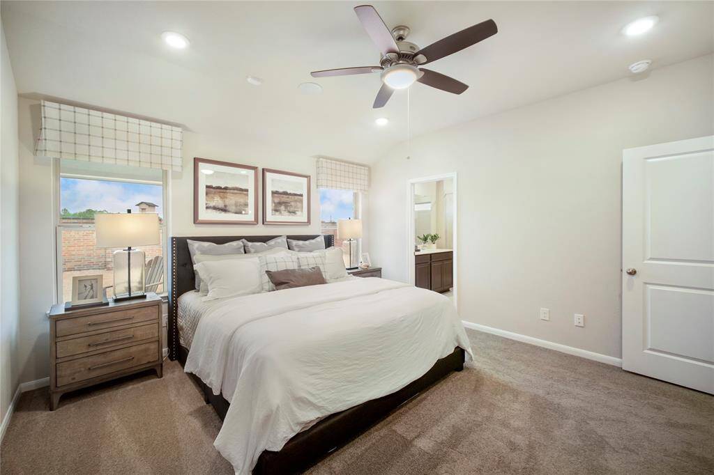 Sample photo of completed home with similar floor plan. As-built color and selections may vary.