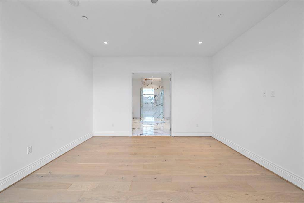 Primary bedroom: Offering ample lighting and layout that provides room extra seating.