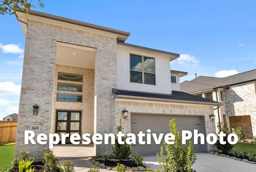 MOVE IN READY!! Westin Homes NEW Construction (Soho, Elevation B) Two story. 4 bedrooms. 3.5 baths. Green grass added to enhance photo.