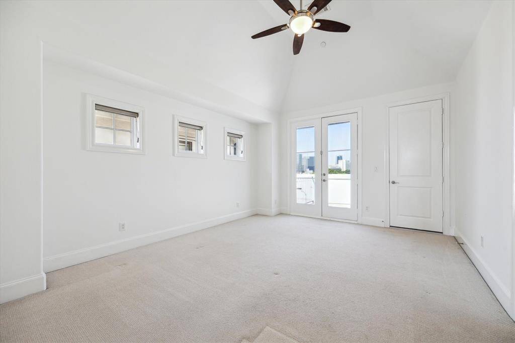 4th floor bedroom with patio access.
