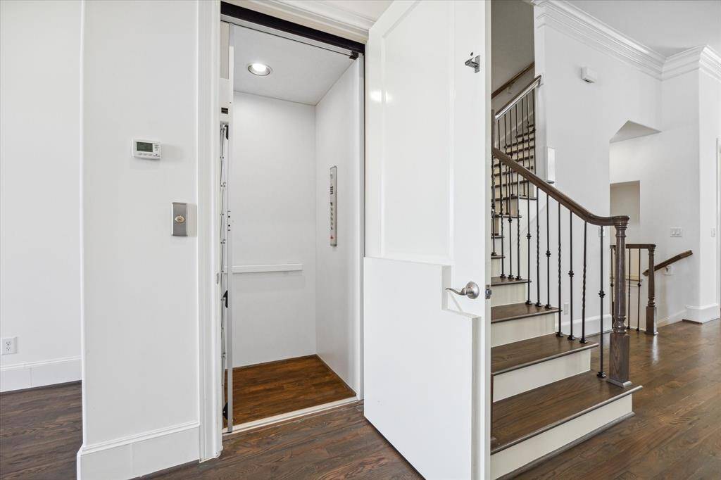 Second floor stairs and elevator.