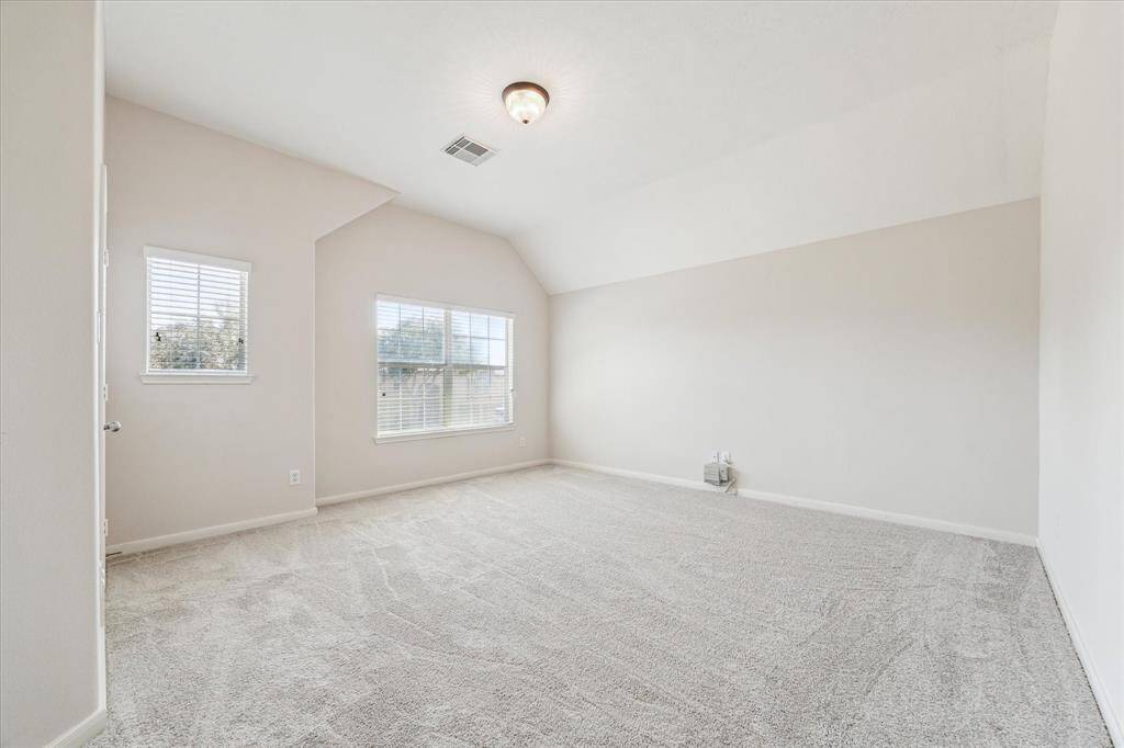 Large bedroom upstairs that is large enough to be a second master. Big walk-in closet.