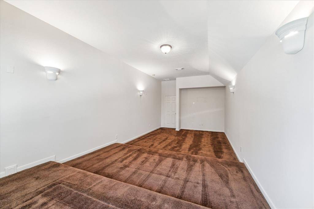 Movie theater that is staged and ready for entertaining