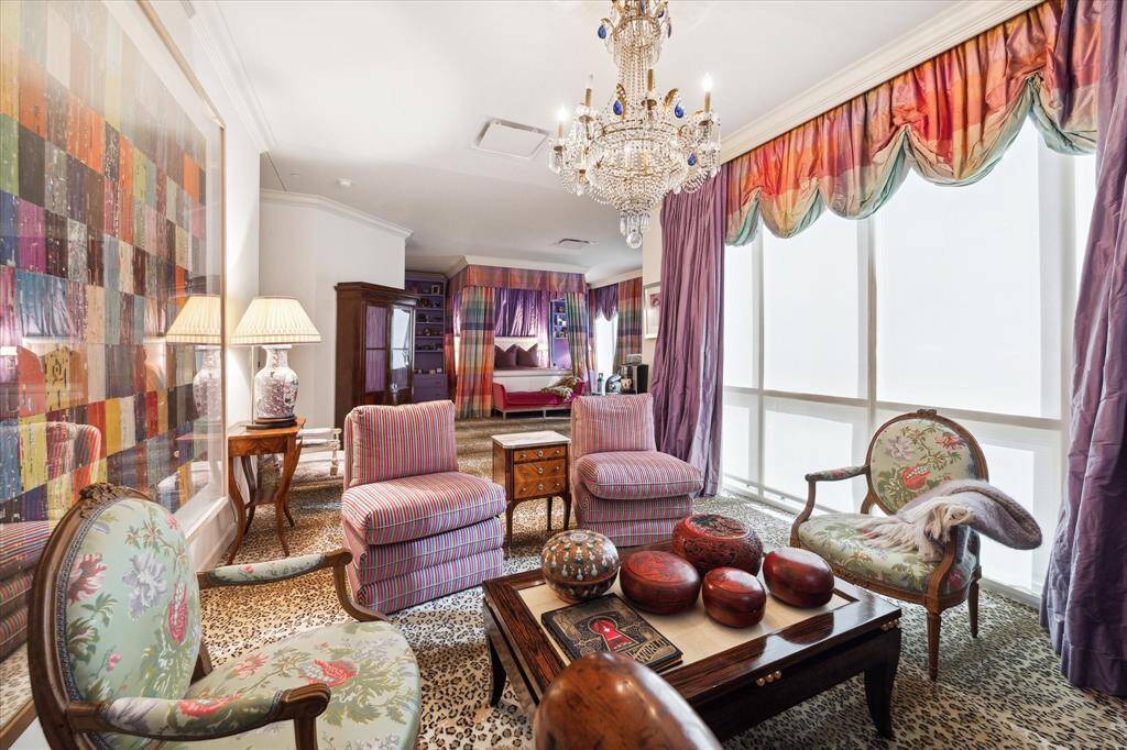A very large primary bedroom with en-suite bathroom, sitting area and spacious closet!