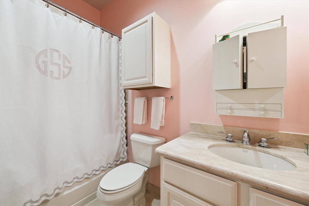The bathroom for one of the secondary bedrooms.