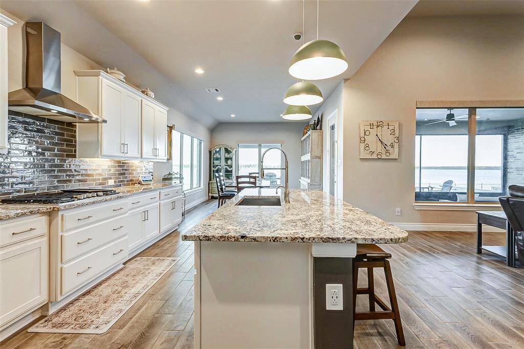 Sit in kitchen open to the family room and cozy fireplace