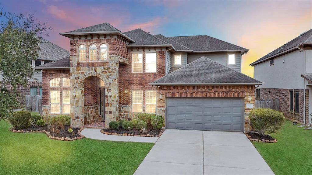 Experience the elegance of this beautifully upgraded stone and brick elevation, enhanced with dramatic custom roof corbels for a truly unique, custom look! This Energy Star-rated home features a spacious three-car garage, a convenient sprinkler system, and so much more!