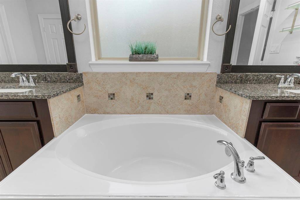 Unwind in the deep soaker tub, perfect for bubbling your stress away! The upgraded frosted window lets in plenty of natural light while ensuring your privacy.