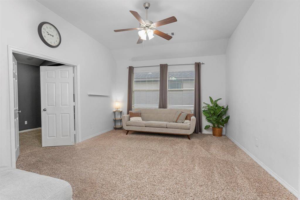 The right wing of the home boasts a fantastic game room, perfect for family gatherings and endless fun! Open your French doors to your Media Room!