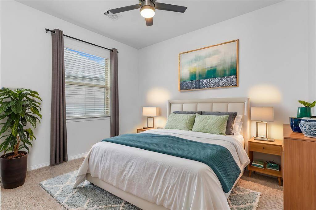 Virtual staging showcases how to arrange this guest suite, complete with its own private bathroom for ultimate comfort and convenience!